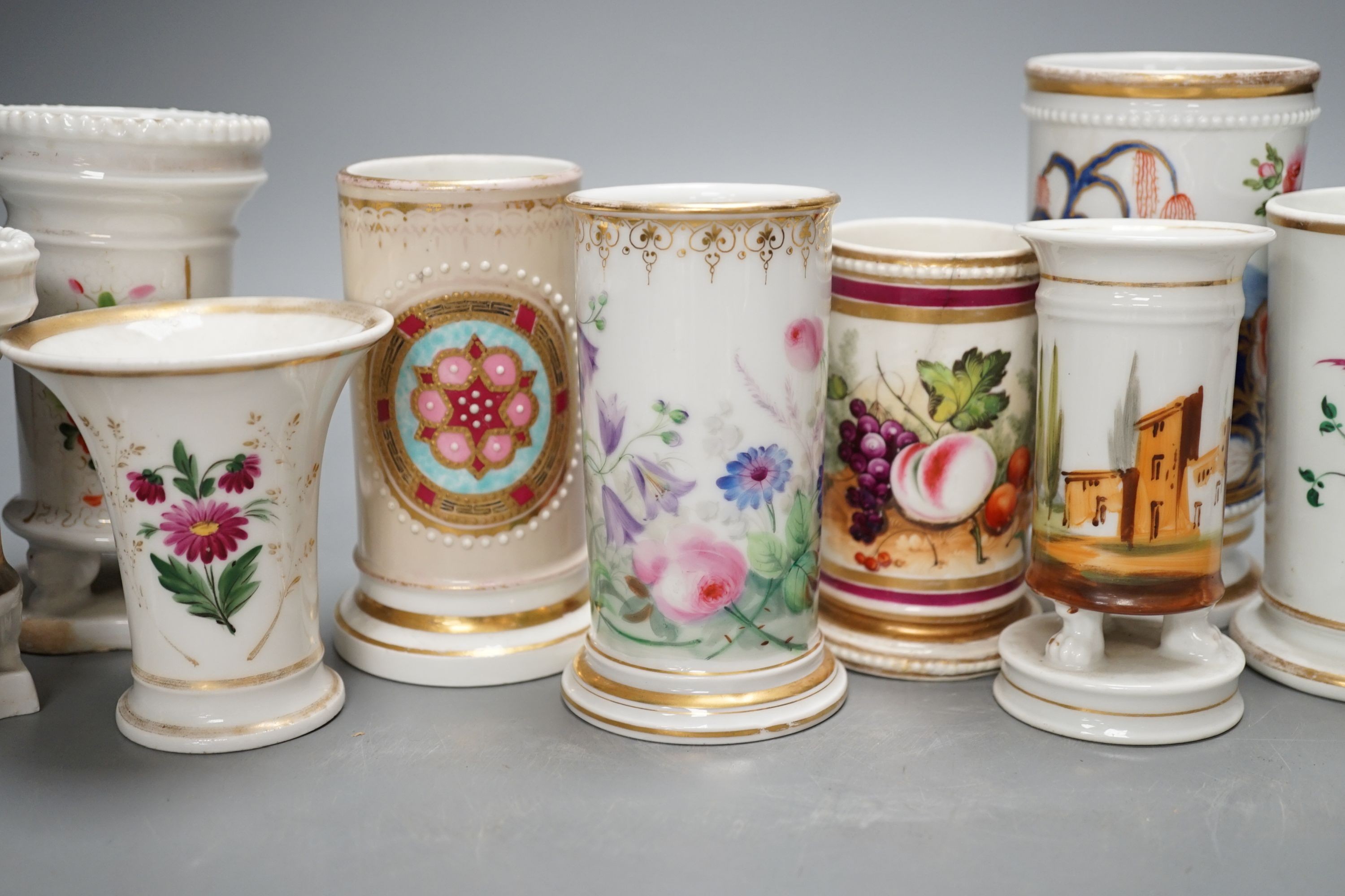 Ten various 19th century porcelain spill vases, tallest 14cm.